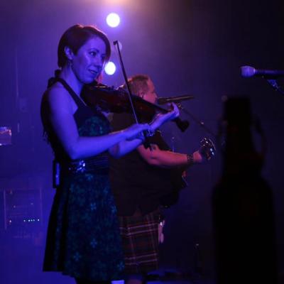 Fiddle player with Singer in Background